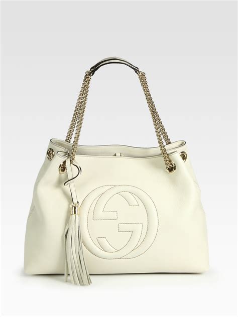 49714 bnd 106176 gucci|white gucci handbag.